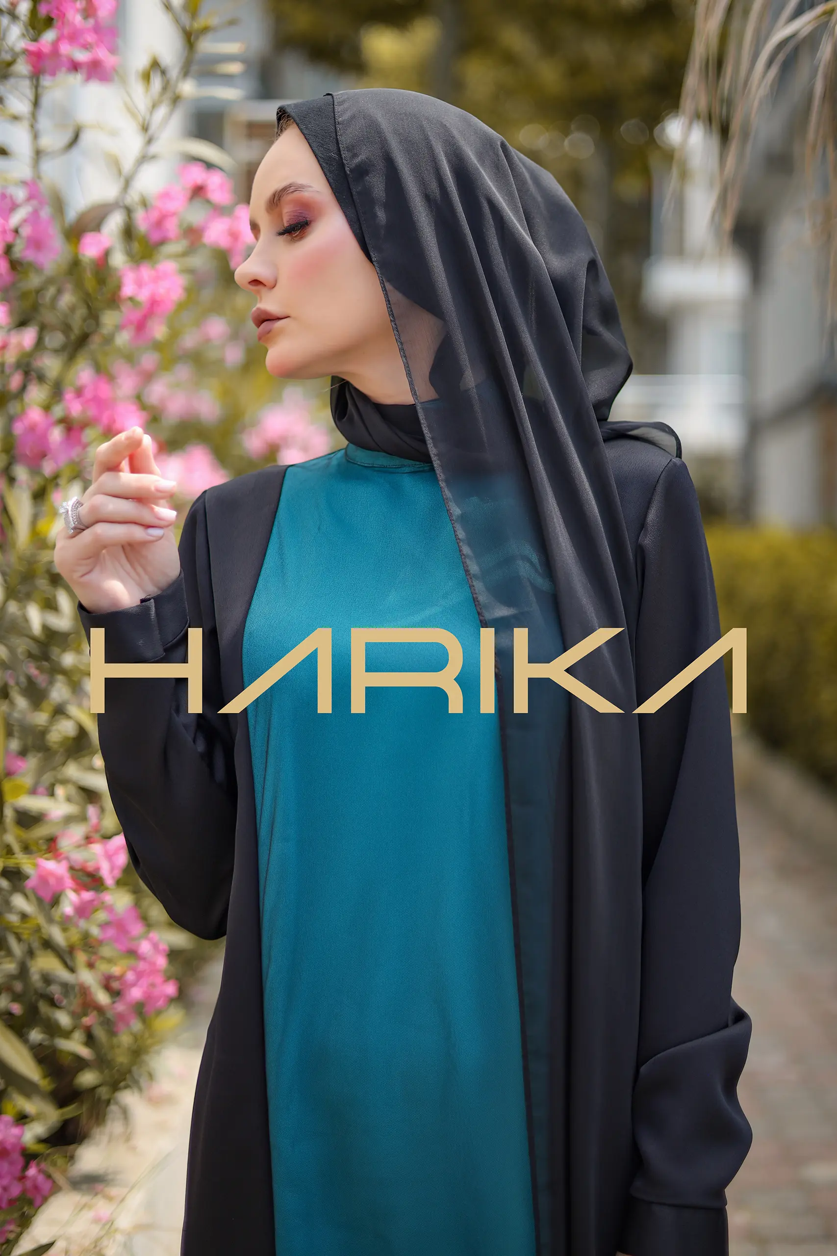 Elegant turquoise and black dress - Image 2