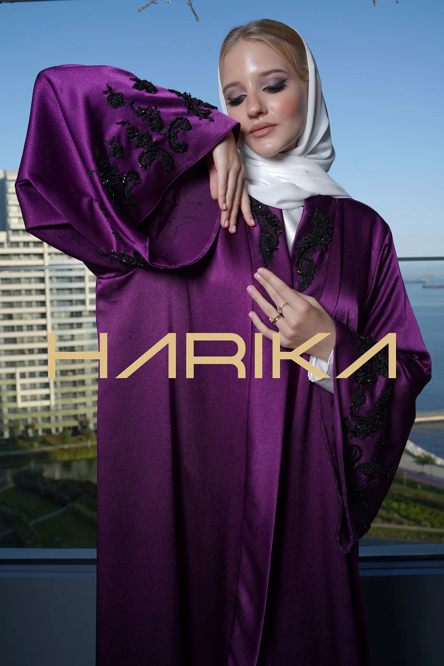 Purple abaya embroidered with black crystals for a distinctive look
