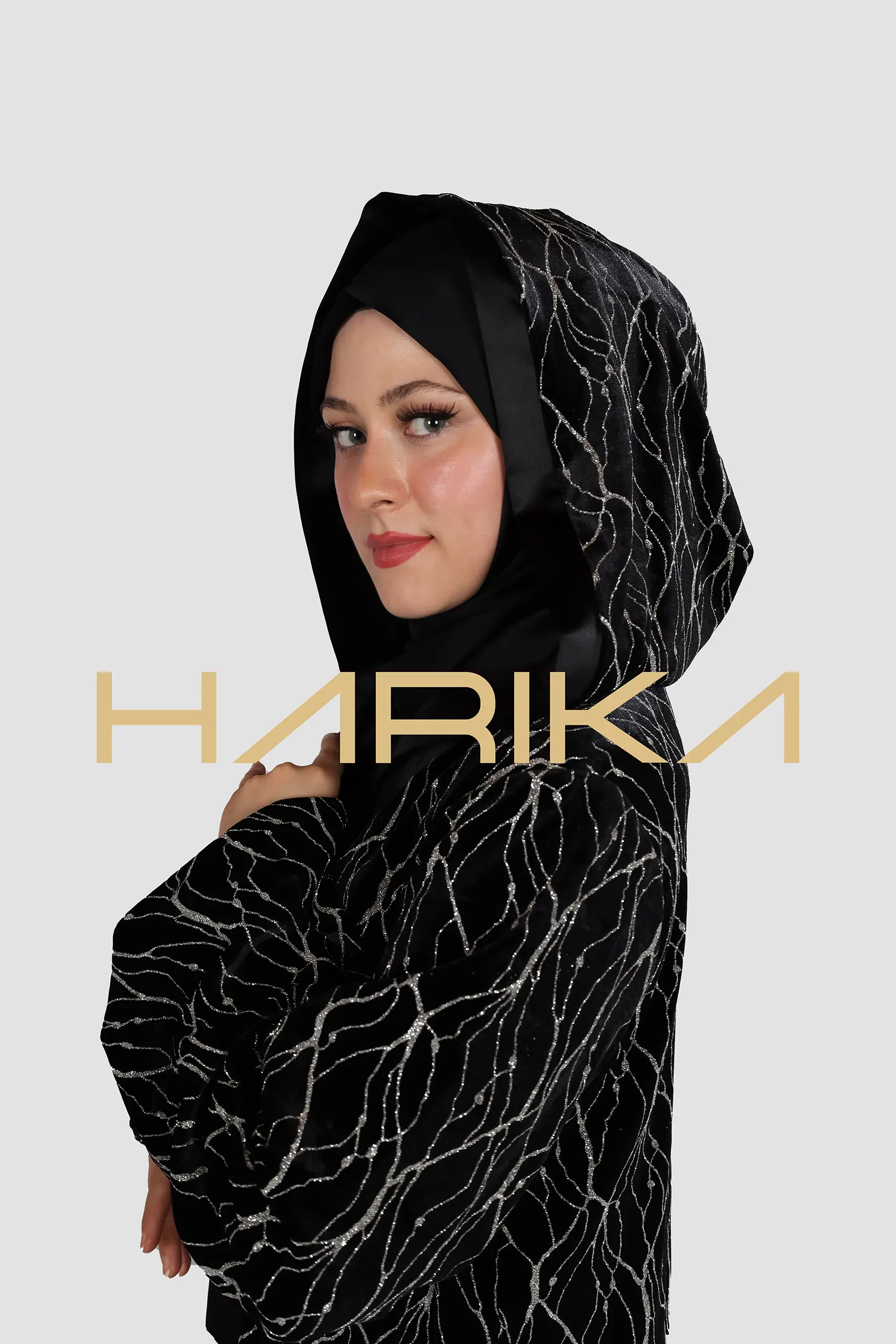 A luxurious velvet abaya adorned with high-quality silver stripes