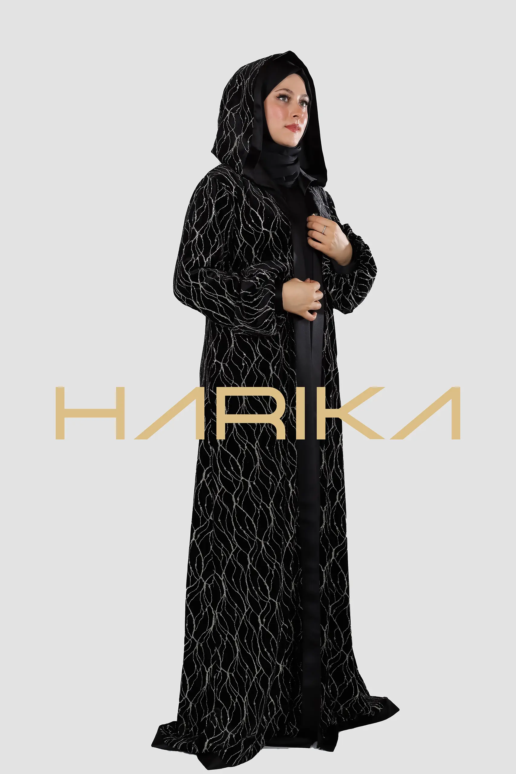 A luxurious velvet abaya adorned with high-quality silver stripes - Image 3