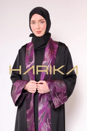 A luxurious silk crepe abaya with purple brocade detailing